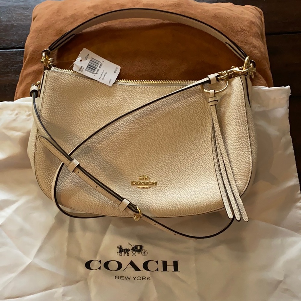 Coach Sutton crossbody cream color